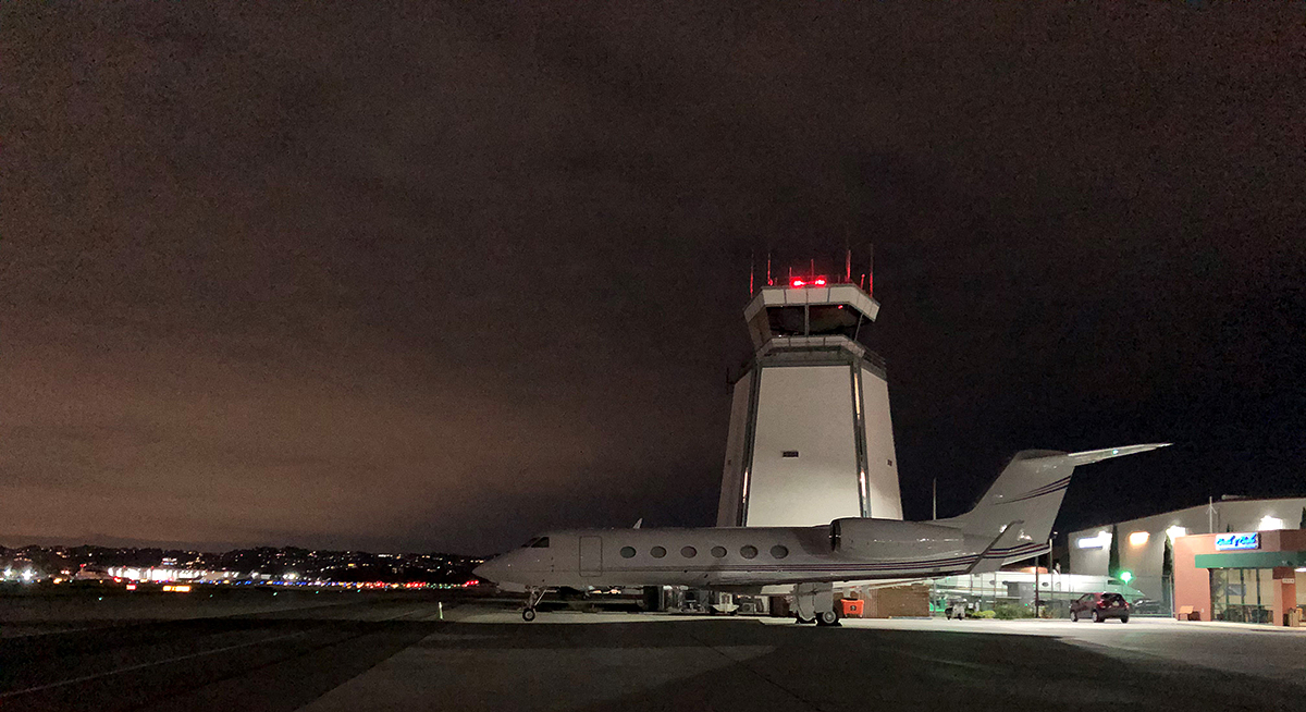 faa-tower-at-night-with-aircraft.jpg