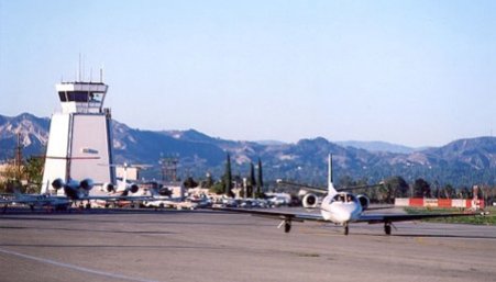 Plane taxiing on the runway at Van Nuys airport